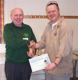 Pat Hughes receives the highly commended certificate from Les Thorne